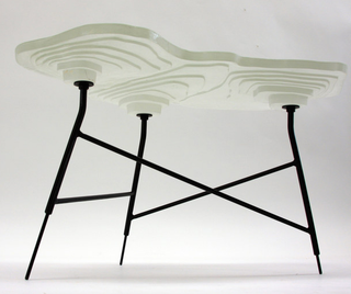 Illustration for article titled Topographic Tables Mix Geology With Interior Design